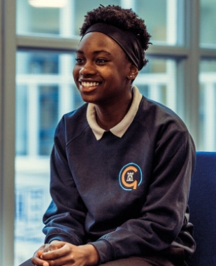 Child smiling in the classroom